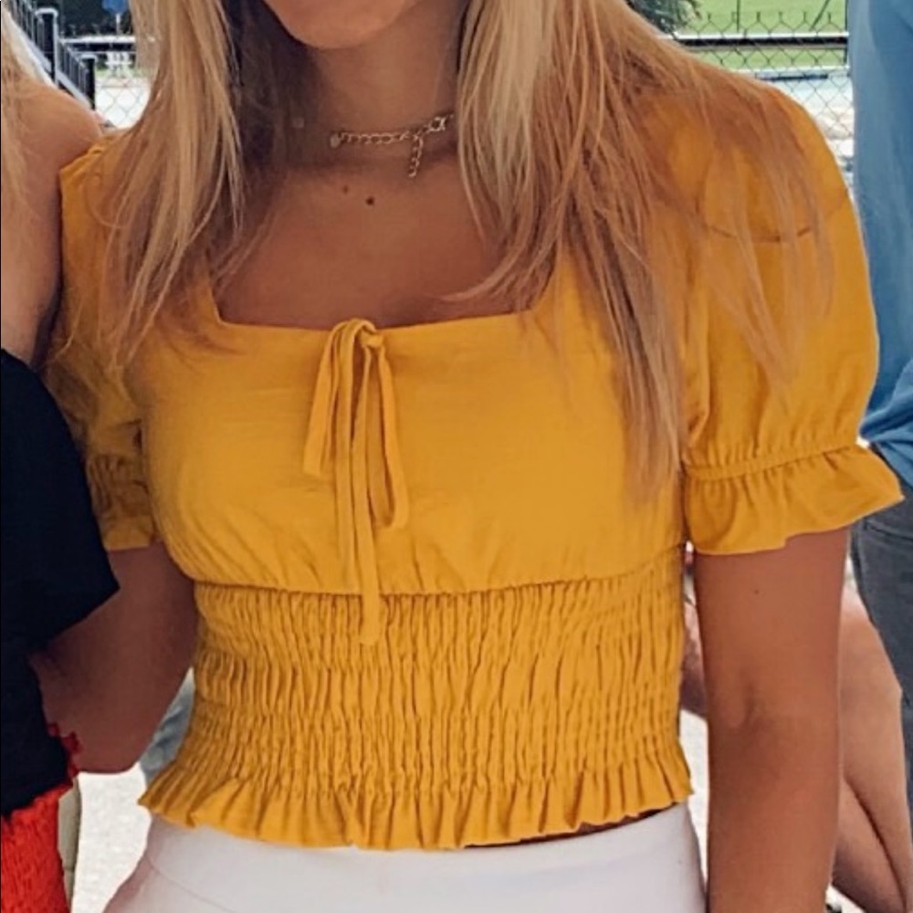 Planet blue top, brand is Lost & Wander